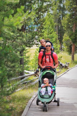 Rob Taylor with Dudes stroller hiking pack Yellowstone Old Faithful