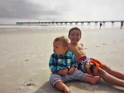 Dudes Sitting in Sand on Jax Beach 1