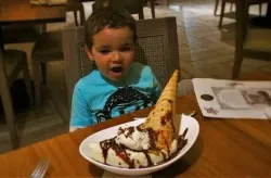 LittleMan eating Shipwreck Sundae Echo Restaurant King and Prince St Simons GA