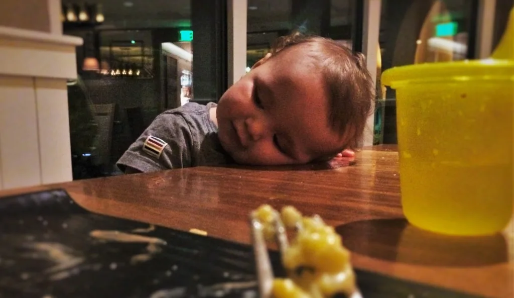 TinyMan Tired after dinner at Echo Restaurant at King and Prince Resort St Simons GA
