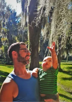 Chris Taylor and TinyMan with Spanish Moss at Fort Frederica St Simons Island GA 2traveldads.com