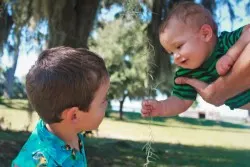 Dudes playing with Spanish Moss at Fort Frederica St Simons Island GA