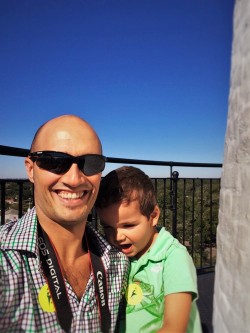 Rob Taylor and LittleMan at the top of St Simons Island Lighthouse Georgia 2traveldads.com