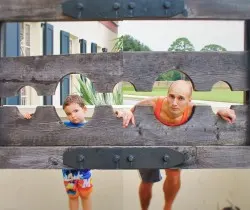 Rob Taylor and LittleMan in Stocks at Pirate Museum St Augustine Florida 2