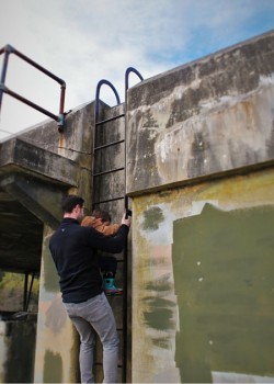 Chris Taylor and LittleMan Climbing Bunkers at Fort Worden