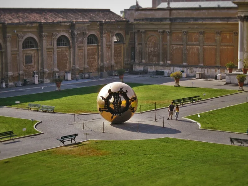 Golden ball in Vatican Museum from Traci Richards Photography 2traveldads.com