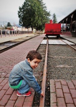 LittleMan Testing Railroad Track at Old Snoqualmie Train Depot Washington 2traveldads.com