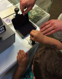 LittleMan getting his National Parks Passport Stamped at Fort Frederica St Simons Island GA