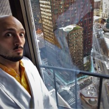 Rob Taylor in Bathrobe with view Luxury Suite at Westin Seattle 1