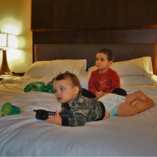 Taylor Kids on Heavenly Bed in Luxury Suite at Westin Seattle 1