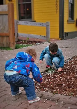 Taylor Kids with catching cherry blossoms Downtown Snoqualmie Washington 1