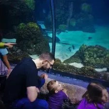 Chris Taylor and TinyMan in Shark Tube at Denver Downtown Aquarium 1