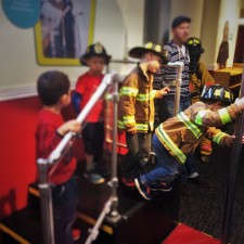 Kids-in-Costume-and-Fire-Pole-at-Fire-Station-No-1-at-Childrens-Museum-of-Denver-1-225x225.jpg