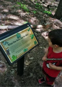 LittleMan at Kennesaw Mountain National Battlefield with nature sign 2traveldads.com