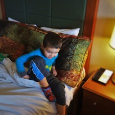 LittleMan in bed at Inverness Hotel Denver Colorado 1