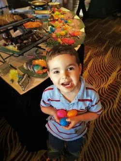 LittleMan with Easter eggs at brunch in Garden Terrace at Inverness Hotel Denver Colorado 1