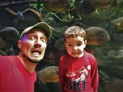 Rob Taylor and LittleMan with Piranhas at Denver Downtown Aquarium 1