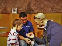 Rob Taylor holding Rosie the Chilean Red Hair Tarantula at the Butterfly Pavilion Denver Colorado 1