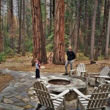 Chris-Taylor-and-LittleMan-by-fire-pit-at-Evergreen-Lodge-at-Yosemite-2traveldads.com_-225x225.jpg