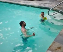 Chris Taylor and LittleMan in the pool at Tenaya Lodge Yosemite 1