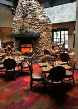 Fireplace in Sierra Restaurant of the Tenaya Lodge Yosemite 2traveldads.com