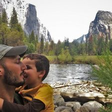 Rob Taylor and littleman Merced River in Yosemite National Park 2traveldads.com
