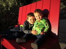 Taylor Kids hugging at Sunset Point at Evergreen Lodge at Yosemite National Park 1