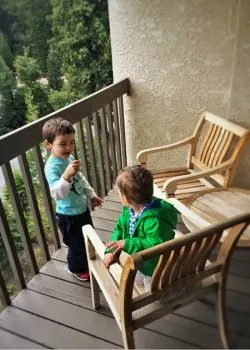 Taylor kids on balcony at Tenaya Lodge Yosemite 2traveldads.com