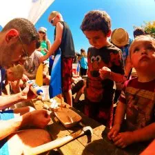 Chris-Taylor-and-Kids-building-boats-at-Anacortes-Waterfront-Festival