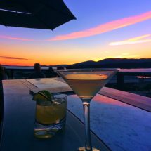 Cocktails at Sunset on Rooftop of Majestic Inn Anacortes