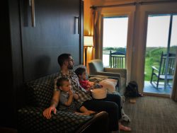 Chris Taylor and Kids watching movie in Condo unit at Pacific Reef Hotel Gold Beach Oregon Coast