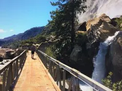 Chris Taylor crossing footbridges at Hetch Hetchy Yosemite National Park 2