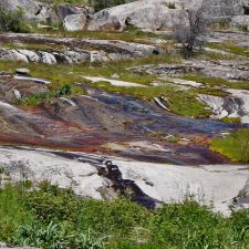 Water flowing over granite at Hetch Hetchy Yosemite National Park 1