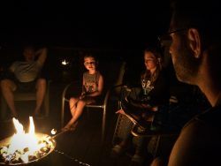 Campfire on deck at VRBO Lake Cushman Family Reunion 2