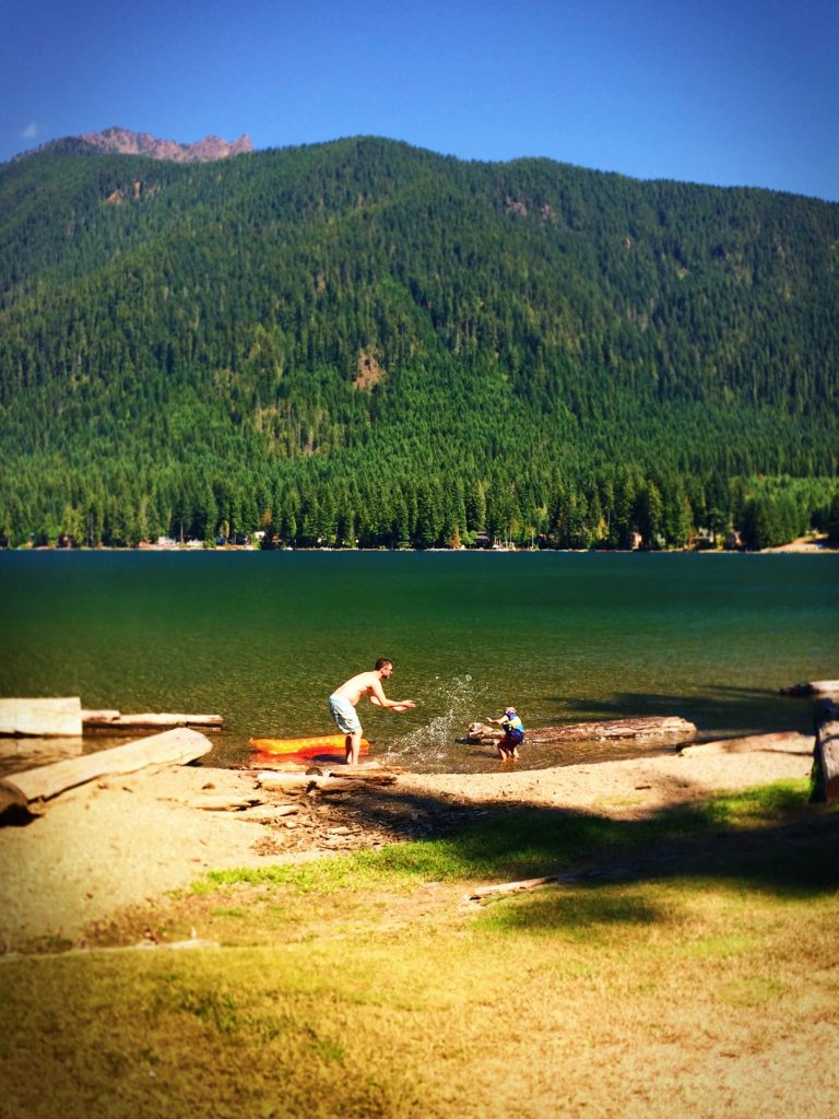 Chris Taylor and LittleMan playing in Lake Cushman Olympic Peninsula 1