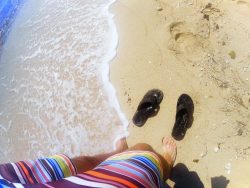 Flip flops on white sand beach in Labadee Haiti 1