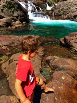 LittleMan playing on rocks at Silver Falls Mt Rainier National Park 1