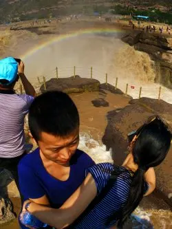 Couple at Hukou Falls with rainbow Shaanxi 1