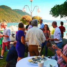 Pretty Fork Destination Dining guests with Oysters Rosario Resort Orcas Island