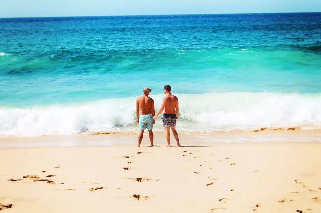 Chris and Rob Taylor on beach while using a timeshare at Playa Grande Cabo San Lucas