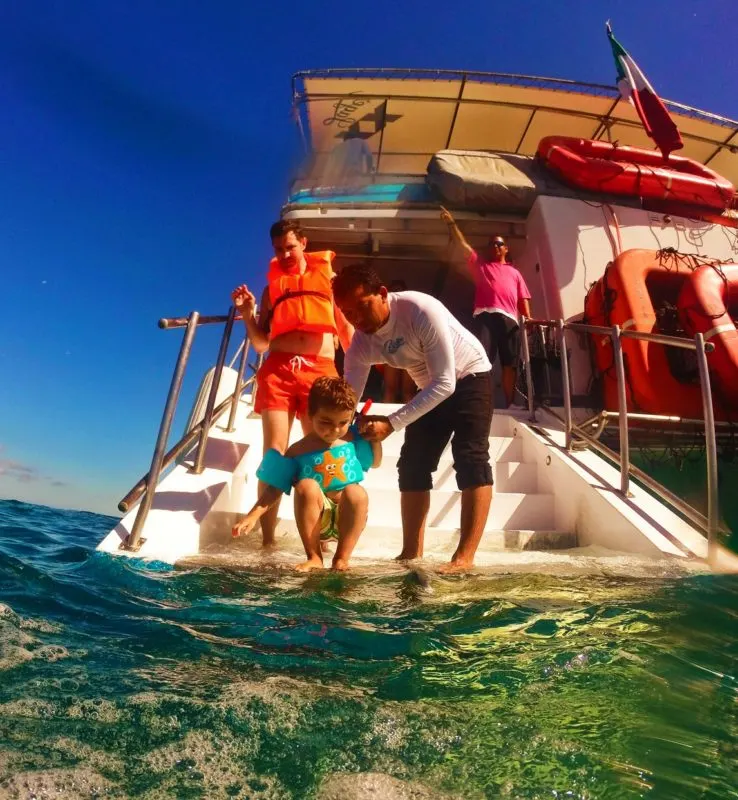 Taylor family snorkeling off the Cabo Escape