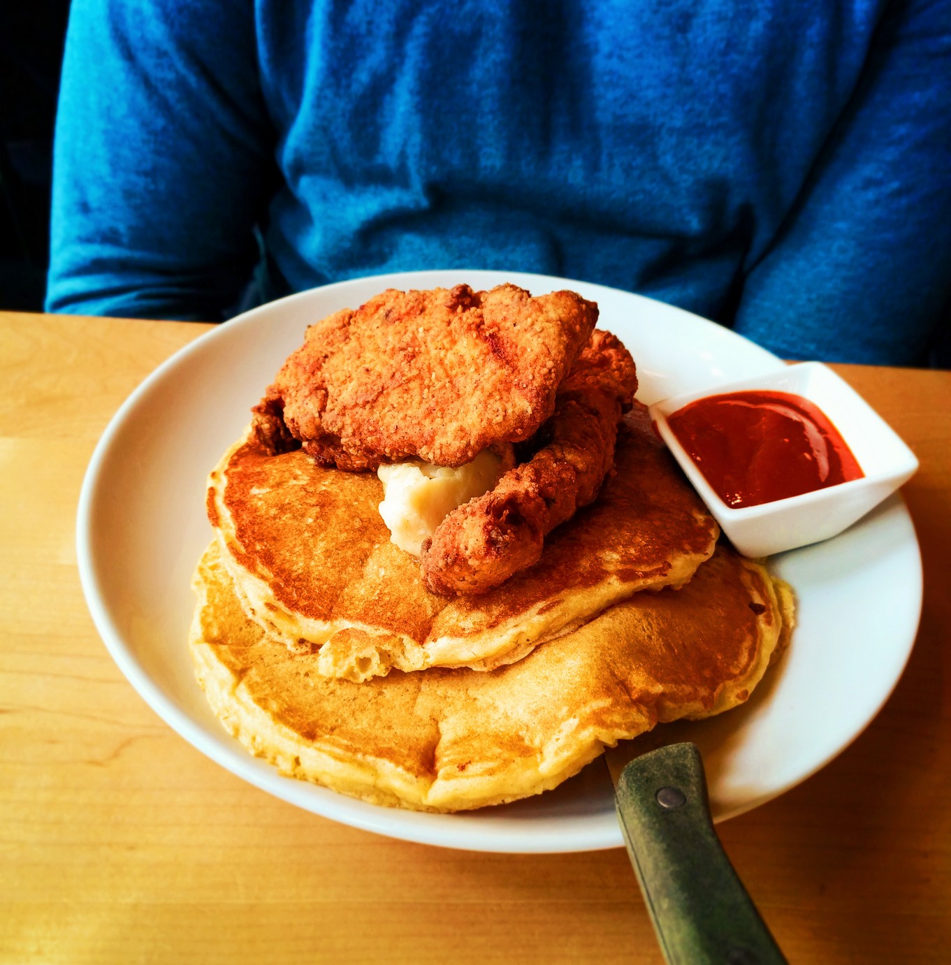 Cornmeal pancakes and fried chicken at Bijou Cafe Portland restaurant 1