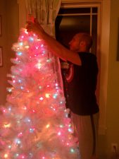 Rob Taylor setting up fake Christmas tree 1