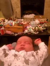 LIttleMan decorating a Christmas tree for the first time 2011