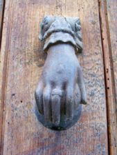 Iron hand knocker on door in Todos Santos
