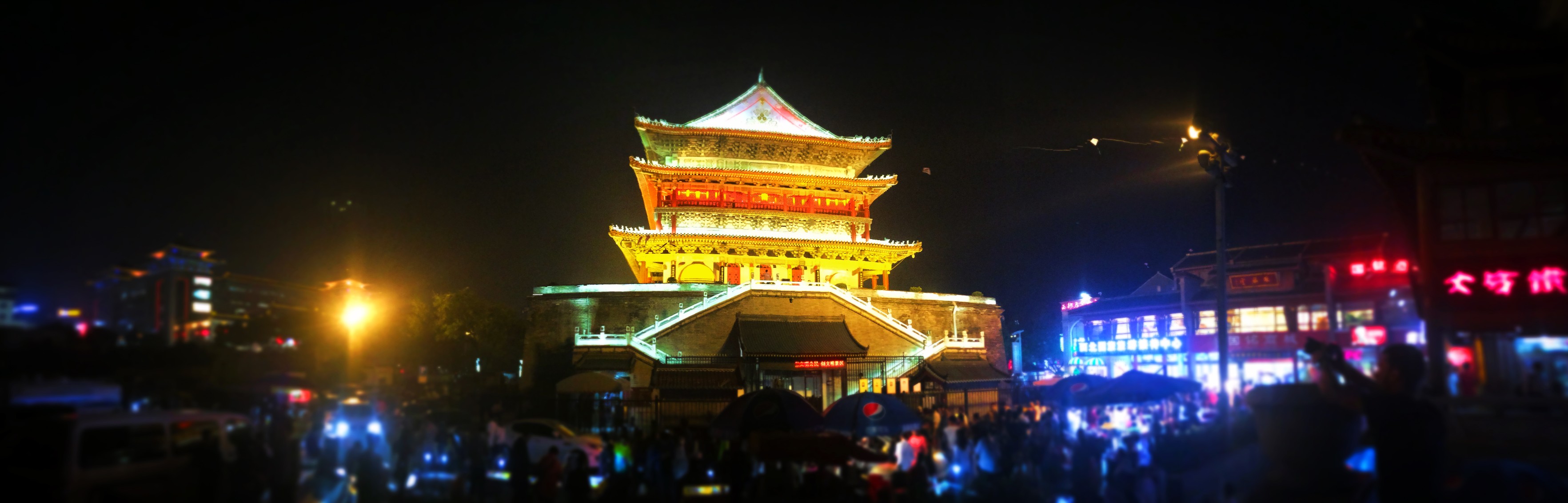 Bell Tower at Muslim Quarter in Xian at night panoramic