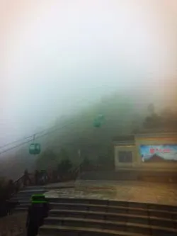 Gondolas in the fog at Taibai Mountain National Park 1