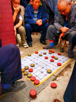 Old Men playing Chinese game in street Baoji China 1