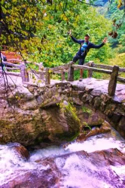 Rob Taylor on Footbridge at Taibai Mountain National Park Shaanxi 1