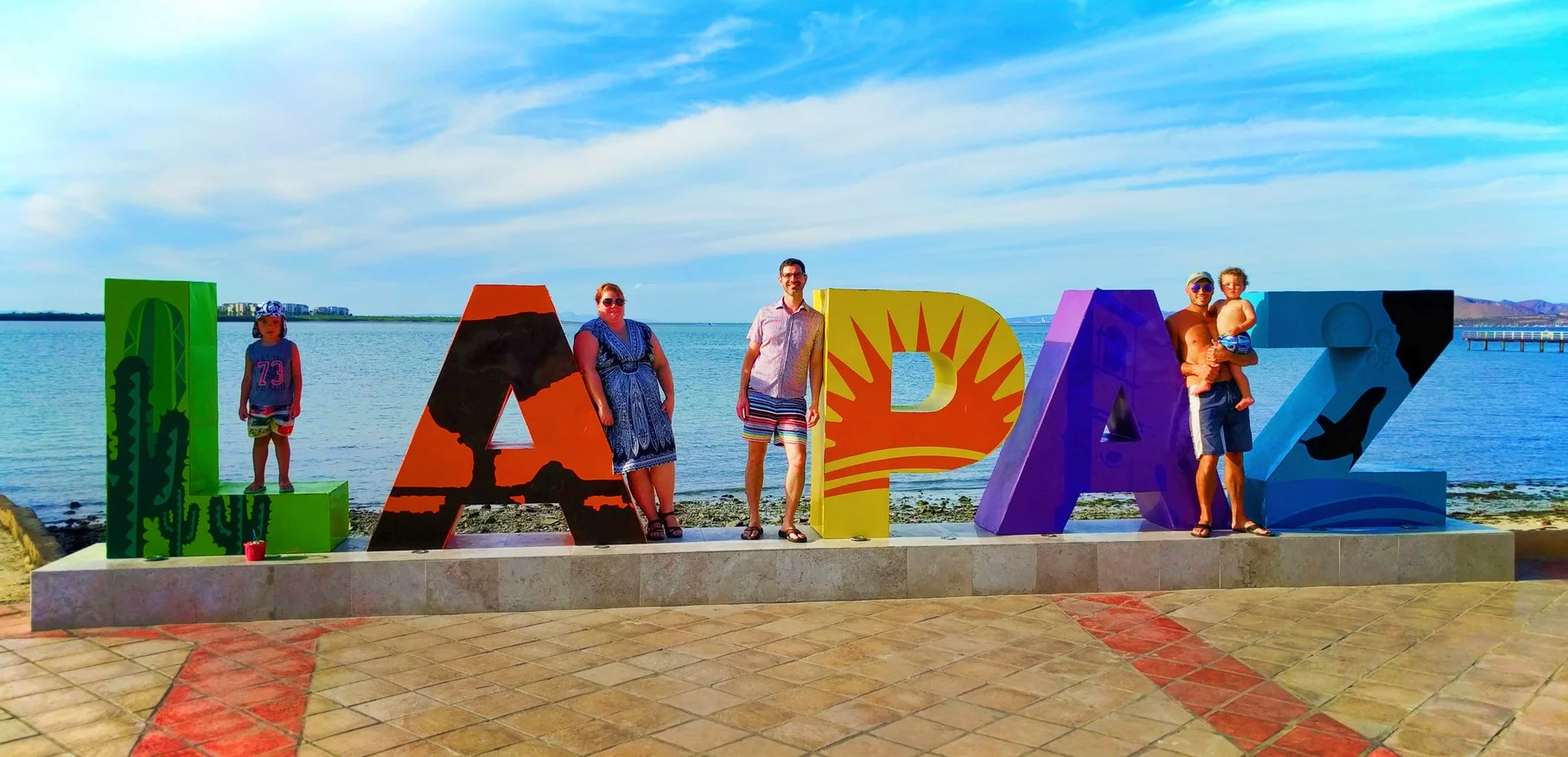 Taylor Family at La Paz VisitMexico sign 1